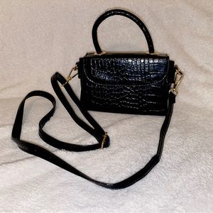 Small black leather crossbody bag